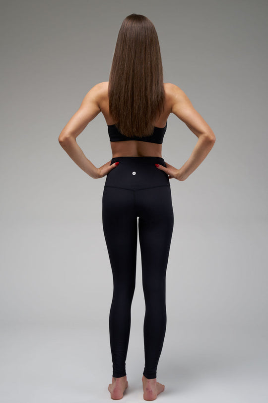 High-waisted leggings with a hidden waistband pocket for essentials.