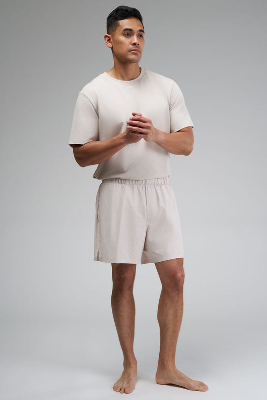 Running shorts with built-in lining pockets, side pockets, and a zippered back pocket for secure essentials.