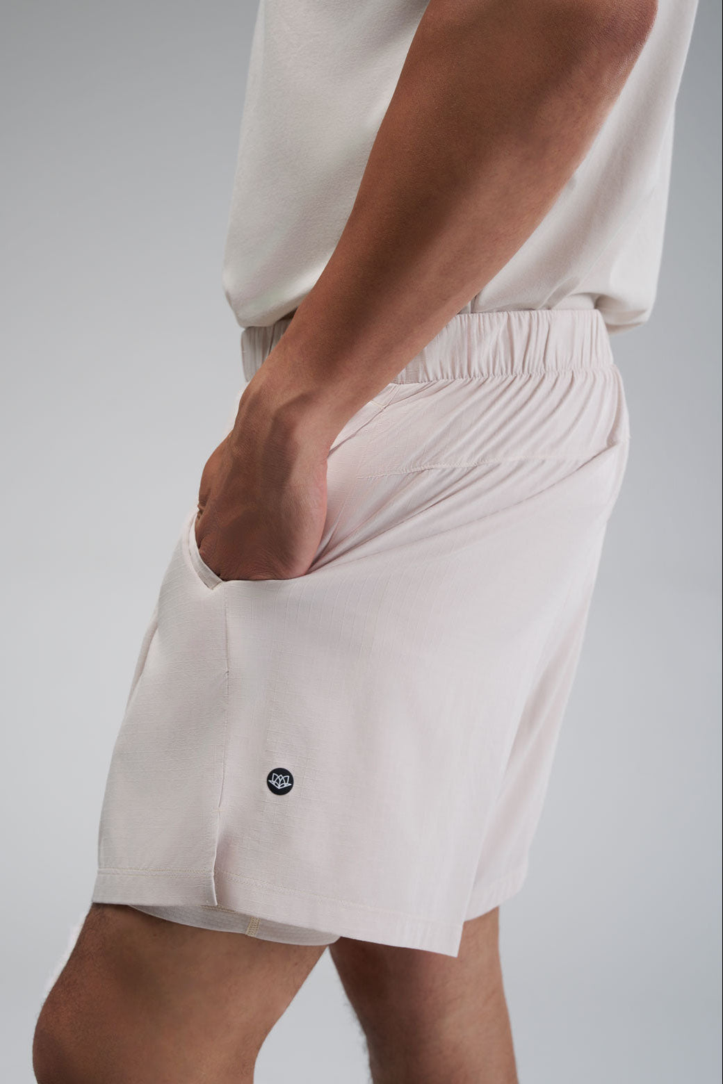 Running shorts with built-in lining pockets, side pockets, and a zippered back pocket for secure essentials.