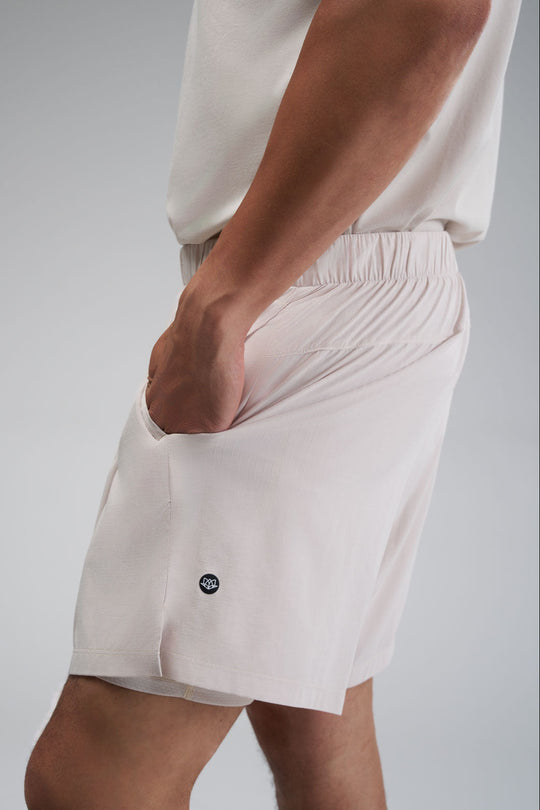 Running shorts with built-in lining pockets, side pockets, and a zippered back pocket for secure essentials.