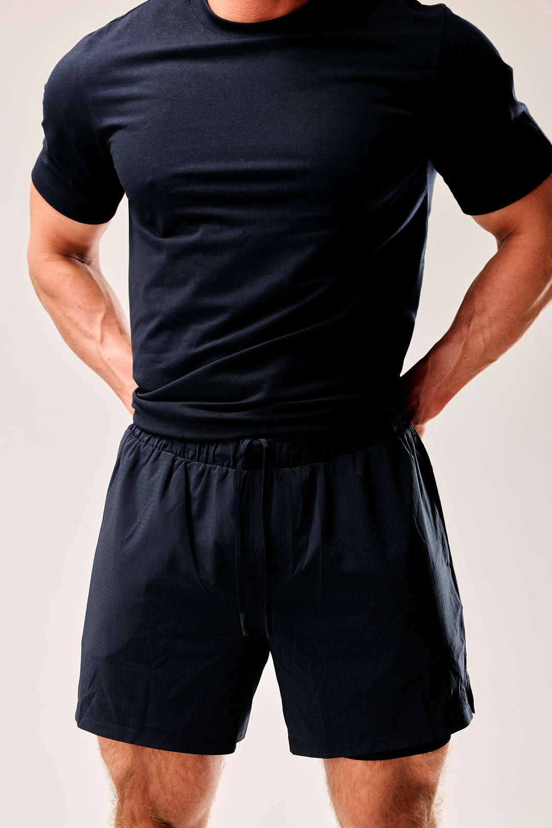 Running shorts with built-in lining pockets, side pockets, and a zippered back pocket for secure essentials.