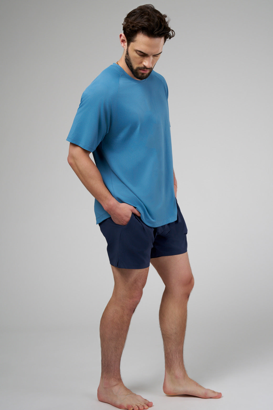Running shorts with built-in lining pockets, side pockets, and a zippered back pocket for secure essentials.
