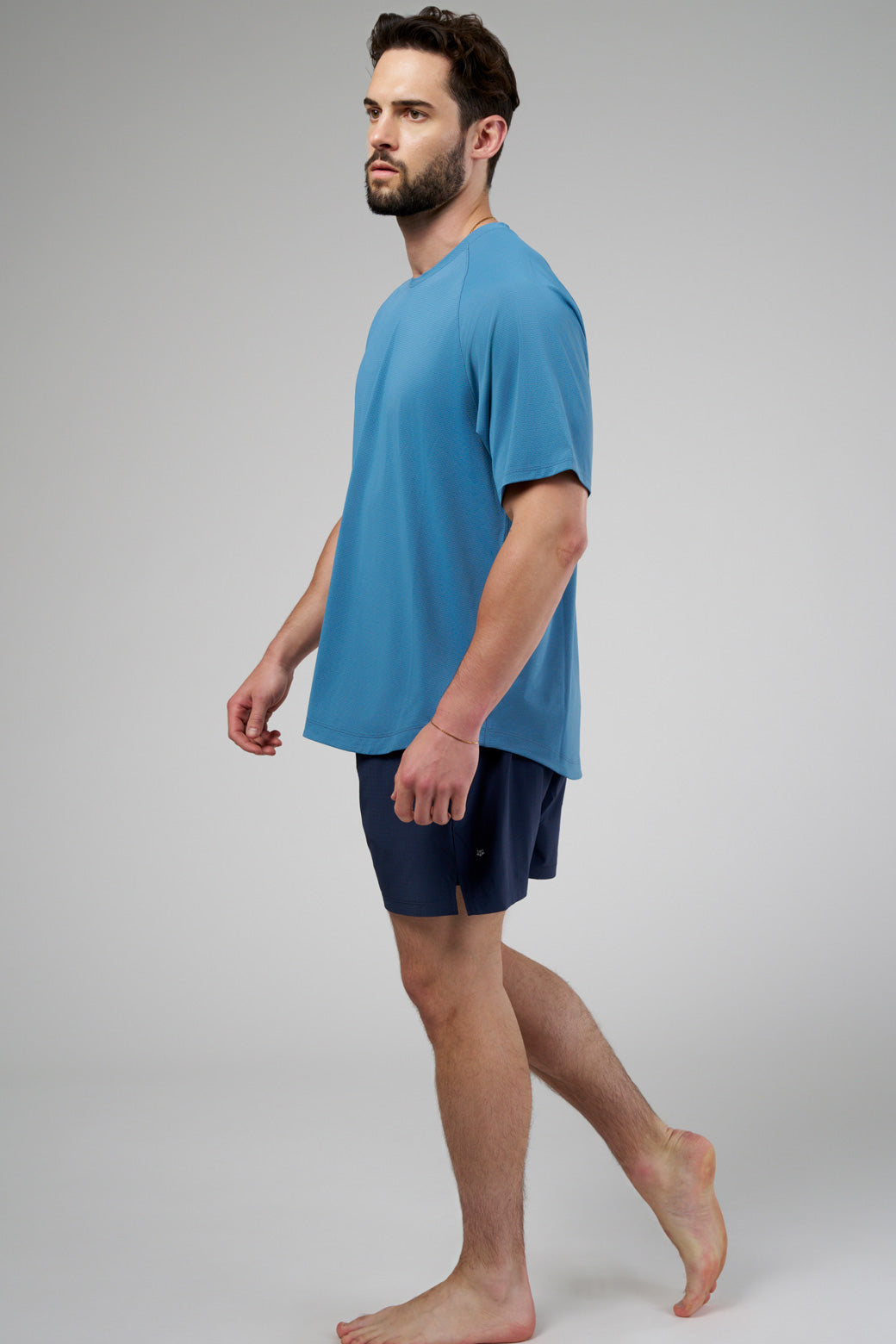 Performance tee with raglan sleeves designed for freedom of movement and all-day comfort.