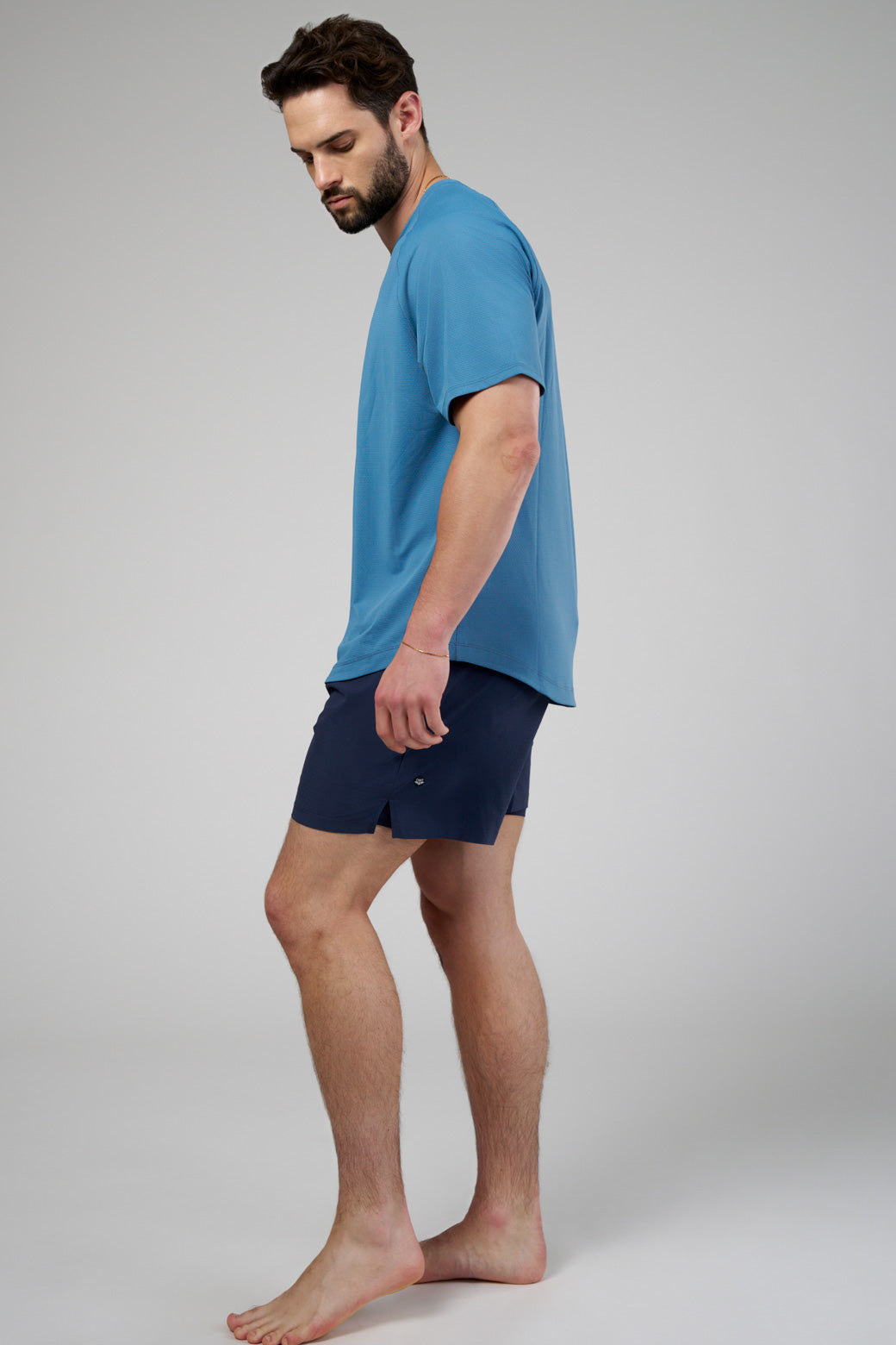 Running shorts with built-in lining pockets, side pockets, and a zippered back pocket for secure essentials.