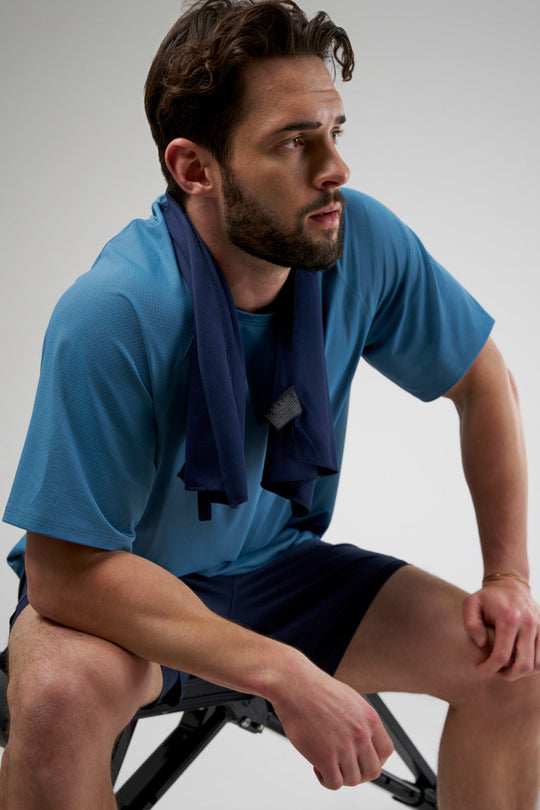 Performance tee with raglan sleeves designed for freedom of movement and all-day comfort.