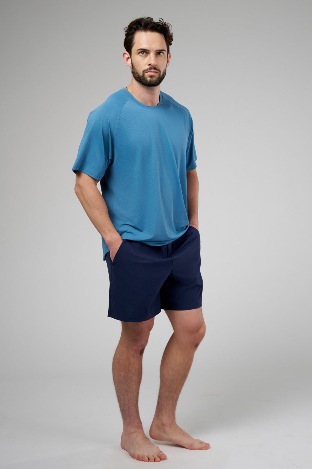 Performance tee with raglan sleeves designed for freedom of movement and all-day comfort.