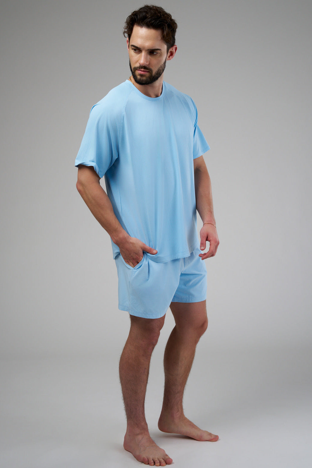 Performance tee with raglan sleeves designed for freedom of movement and all-day comfort.