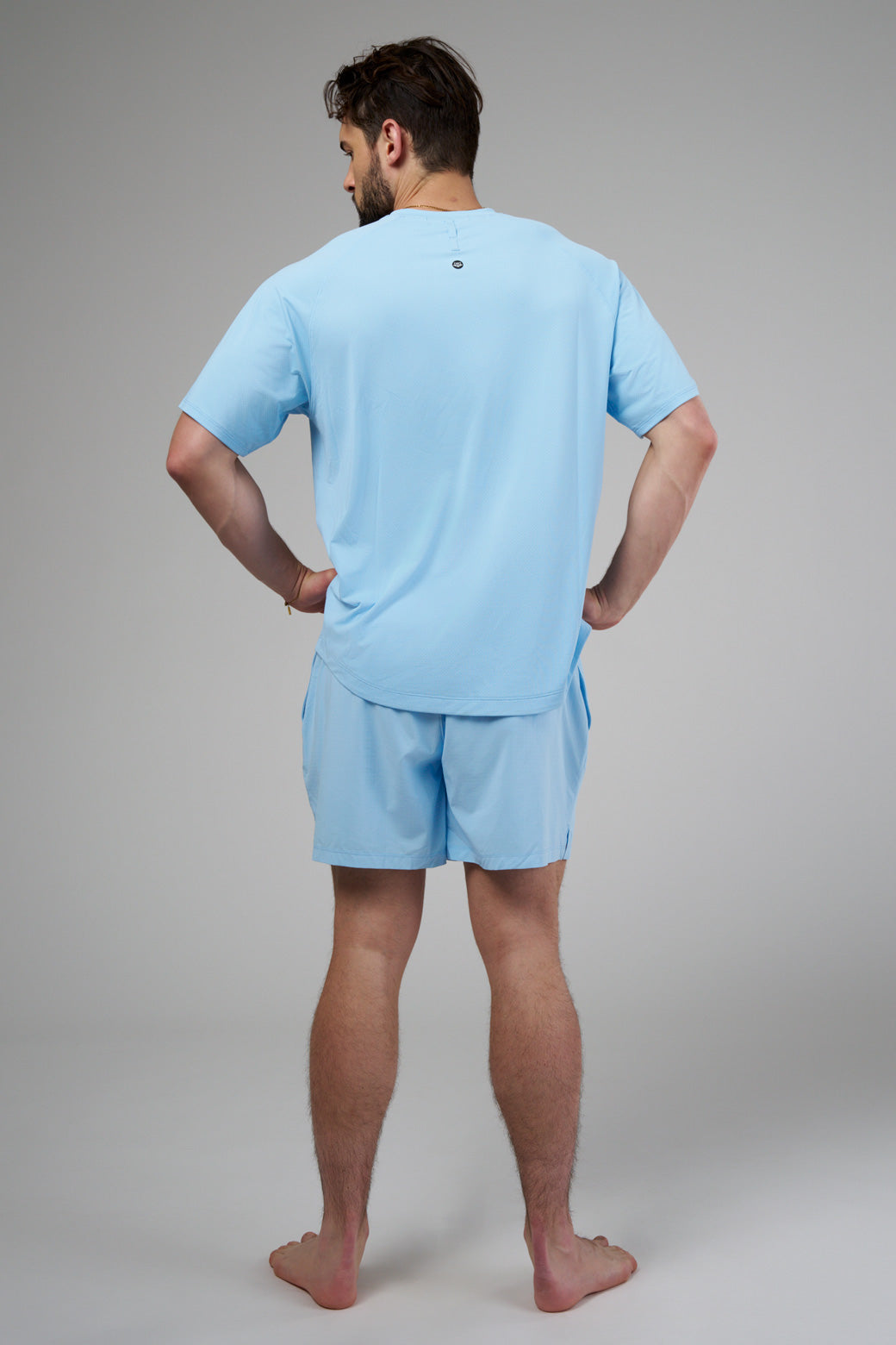 Running shorts with built-in lining pockets, side pockets, and a zippered back pocket for secure essentials.