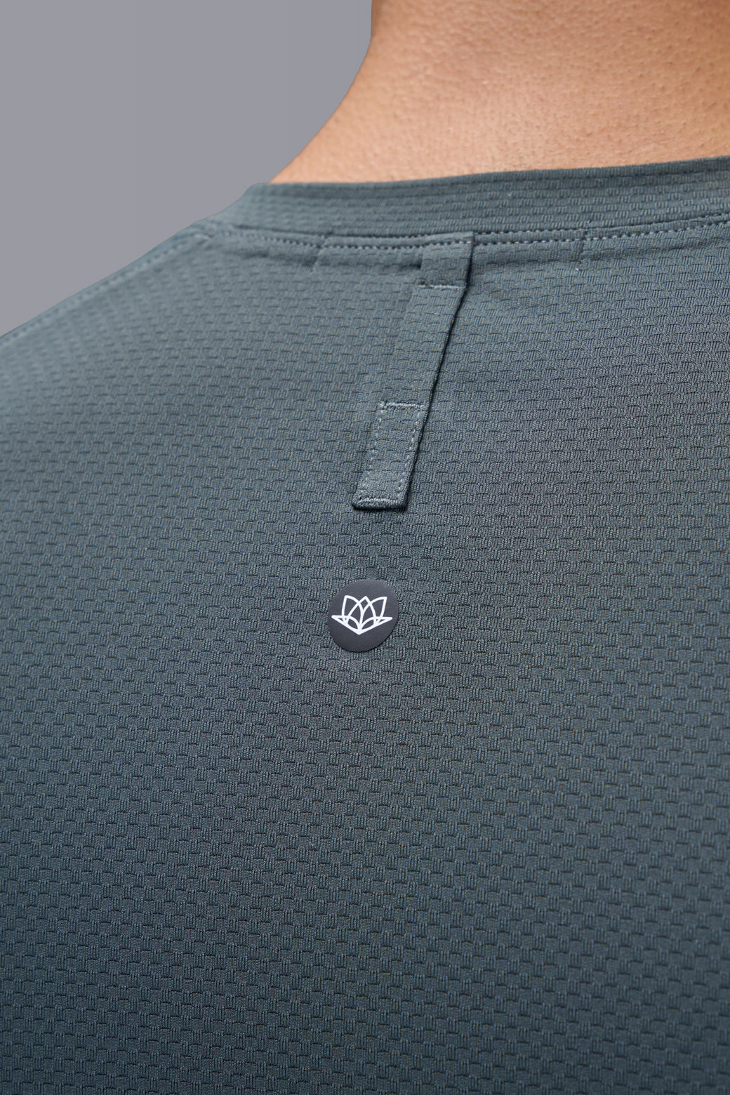 Performance tee with raglan sleeves designed for freedom of movement and all-day comfort.