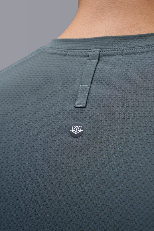 Performance tee with raglan sleeves designed for freedom of movement and all-day comfort.