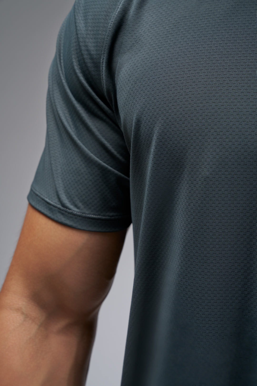 Performance tee with raglan sleeves designed for freedom of movement and all-day comfort.
