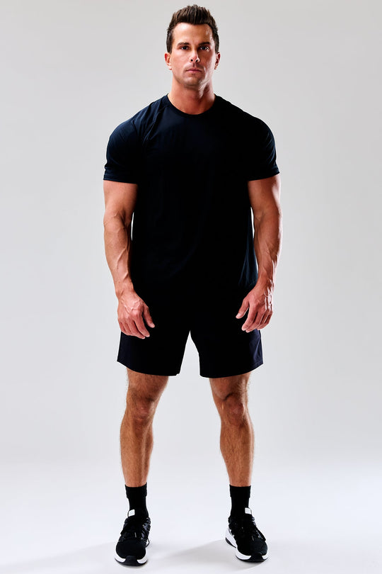 Performance tee with raglan sleeves designed for freedom of movement and all-day comfort.