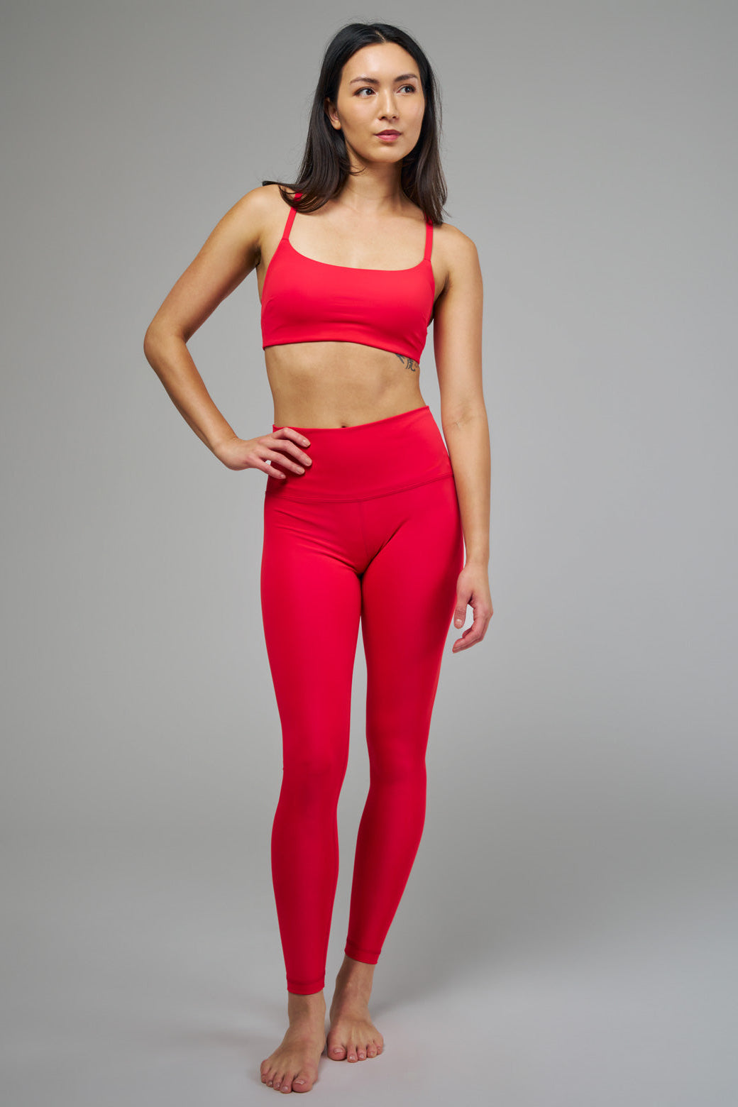 Women's Red Sports Bra and Leggings Front