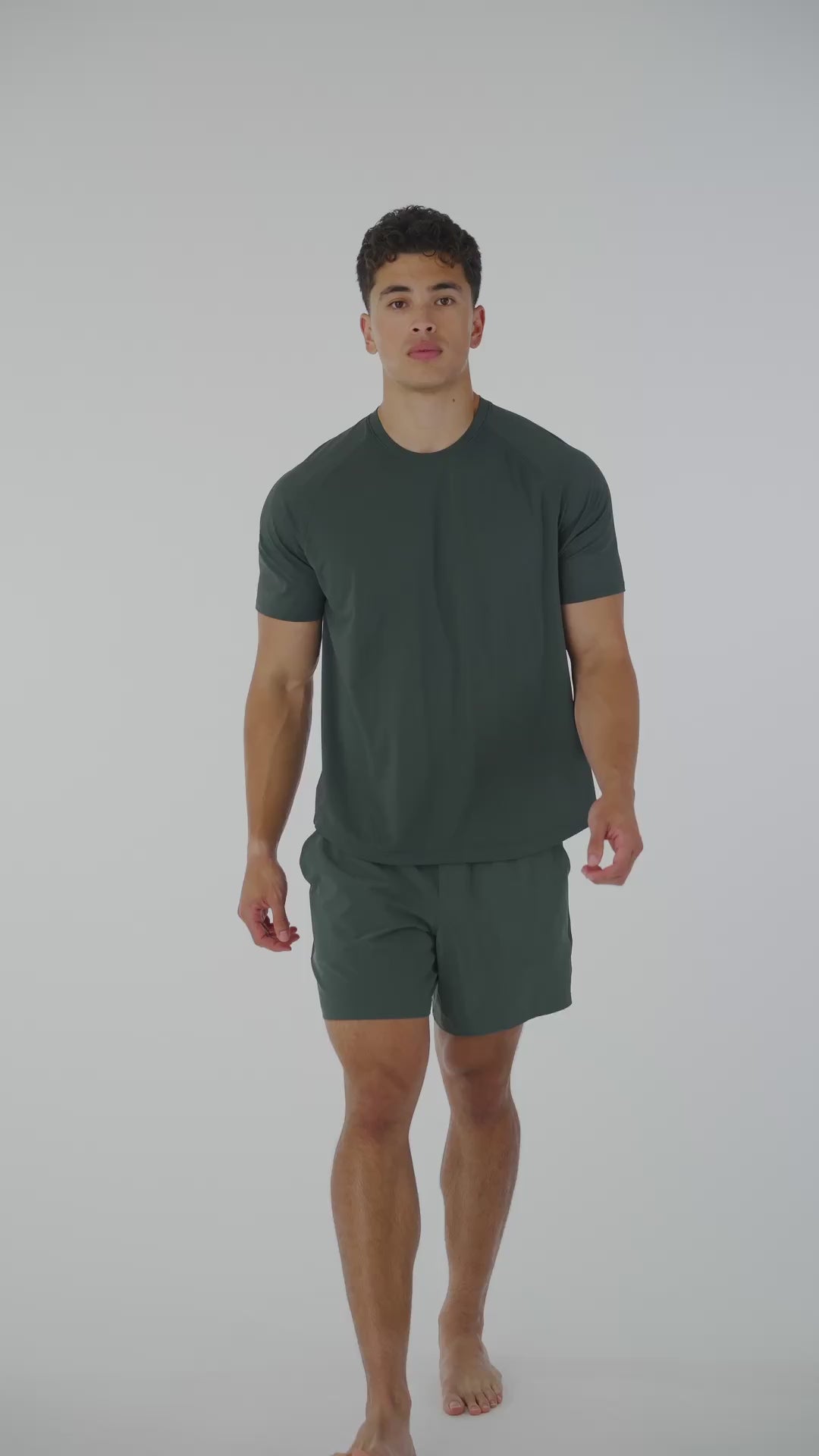 Performance tee with raglan sleeves designed for freedom of movement and all-day comfort.